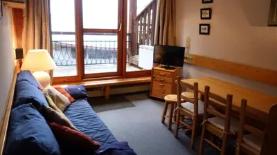 Coin salon dans l'établissement Résidence Aiguille Grive Bat Iii - Appartement 2 pièces 6 personnes en duplex, skis aux pieds, dans le village de Charmettoger à Arc 1800 MAE-2032
