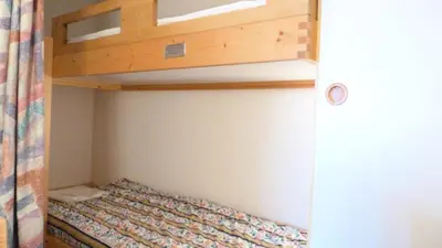 Un ou plusieurs lits dans un hébergement de l'établissement Résidence Aiguille Grive Bat Iii - Appartement 2 pièces 6 personnes en duplex, skis aux pieds, dans le village de Charmettoger à Arc 1800 MAE-2032