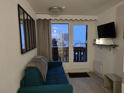 Télévision ou salle de divertissement dans l'établissement CHALET CLUB VAL CLARET 1 46