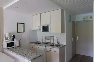 Cuisine ou kitchenette dans l'établissement Tignes Joli Studio avec vue imprenable sur le lac