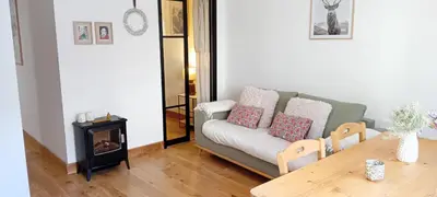 Coin salon dans l'établissement Balcons G 013 - PARC NAT VANOISE appart 8 pers