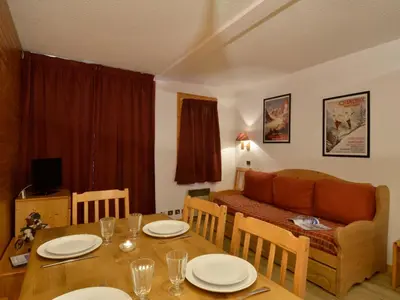 Coin salon dans l'établissement Appartement confortable 3 pièces 7 pers avec balcon près des pistes - FR-1-181-2029