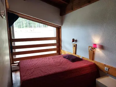 Un ou plusieurs lits dans un hébergement de l'établissement Résidence Tournavelles - Appartement 4 pièces 8/10 personnes en duplex, avec vue sur les pistes, skis aux pieds et proche des commerces dans le village d MAE-1865