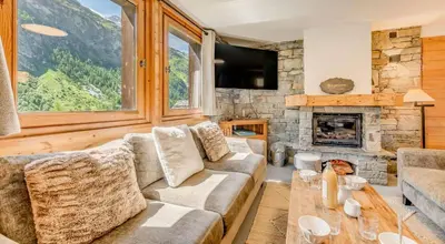 Coin salon dans l'établissement Chalet Napoleon - Chalet - 108m2 - 5 chambres, 5 salles de bain MAE-2014