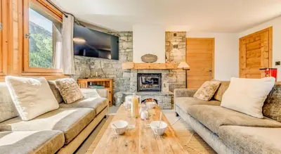 Coin salon dans l'établissement Chalet Napoleon - Chalet - 108m2 - 5 chambres, 5 salles de bain MAE-2014