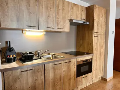 Cuisine ou kitchenette dans l'établissement Appartement station Sainte Foy Tarentaise