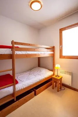 Un ou plusieurs lits dans un hébergement de l'établissement Balcons B 014 - PARC NAT VANOISE appart 6 pers