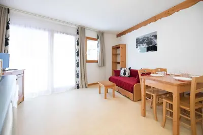 Télévision ou salle de divertissement dans l'établissement Balcons G 015 - PARC NAT VANOISE studio 4 pers