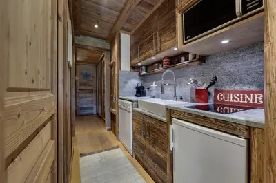 Cuisine ou kitchenette dans l'établissement Appartement esprit chalet - splendide vue montagne à 180
