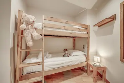 Un ou plusieurs lits dans un hébergement de l'établissement Résidence Palafour - Appartements «Palafour Lodges» MAE-0174