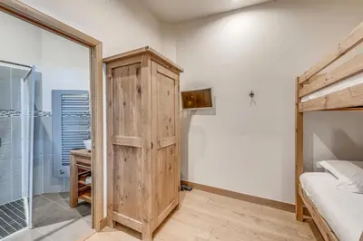 Un ou plusieurs lits dans un hébergement de l'établissement Résidence Palafour - Appartements «Palafour Lodges» MAE-0184