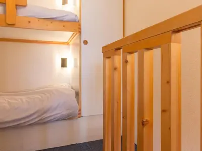 Un ou plusieurs lits dans un hébergement de l'établissement Duplex confortable, ski aux pieds, 6 pers, balcon sud-ouest - FR-1-346-477