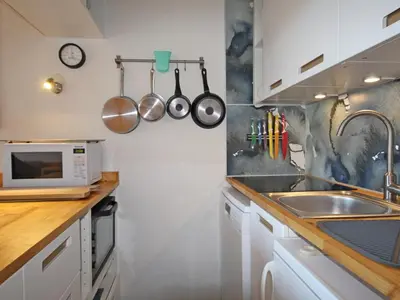 Cuisine ou kitchenette dans l'établissement Duplex confortable, ski aux pieds, 6 pers, balcon sud-ouest - FR-1-346-477