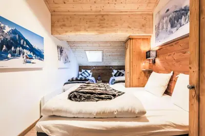 Un ou plusieurs lits dans un hébergement de l'établissement Résidence Les Arcs 1950 Le Village - maeva Home - Appartement 3 pièces 8 personnes Exclusive MAE-3892