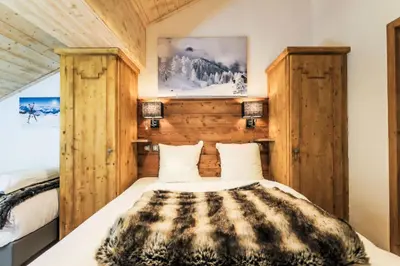 Un ou plusieurs lits dans un hébergement de l'établissement Résidence Les Arcs 1950 Le Village - maeva Home - Appartement 3 pièces 8 personnes Exclusive MAE-3892