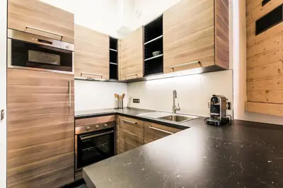 Cuisine ou kitchenette dans l'établissement Résidence Les Arcs 1950 Le Village - maeva Home - Appartement 3 pièces 8 personnes Exclusive MAE-3892