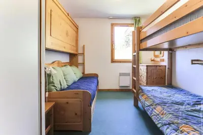 Un ou plusieurs lits dans un hébergement de l'établissement Résidence Presles - Appartement duplex de charme 4 pièces 8 personnes à Vallandry dans un quartier calme et proche des pistes MAE-2004