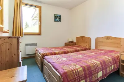 Un ou plusieurs lits dans un hébergement de l'établissement Résidence Presles - Appartement duplex de charme 4 pièces 8 personnes à Vallandry dans un quartier calme et proche des pistes MAE-2004