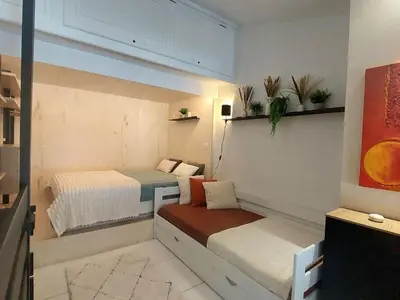 Un ou plusieurs lits dans un hébergement de l'établissement Duplex Mezzanine 5 pers. · Ski aux pieds · Vue Mont Blanc - FR-1-346-426