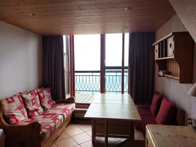 Coin salon dans l'établissement Résidence Vogel - Chaleureux duplex pour 4 personnes avec une très belle vue sur la vallée dans le village de Charmettoger à Arc 1800 MAE-2129