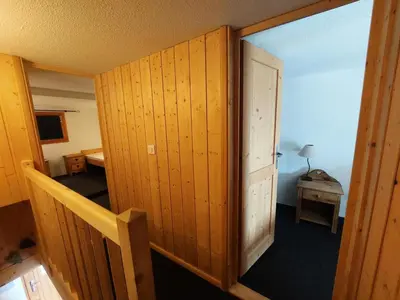 Un ou plusieurs lits dans un hébergement de l'établissement Résidence Vogel - Chaleureux duplex pour 4 personnes avec une très belle vue sur la vallée dans le village de Charmettoger à Arc 1800 MAE-2129