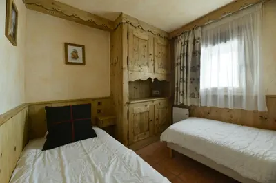 Un ou plusieurs lits dans un hébergement de l'établissement Chalet De Bellecote - Chalet de charme type savoyard 9 personnes à Vallandry situé dans un quartier calme avec accès direct aux pistes MAE-1996