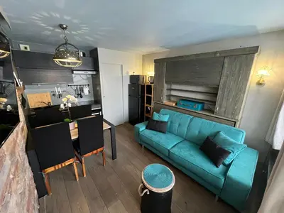 Coin salon dans l'établissement Appt 123 Home Club Tignes