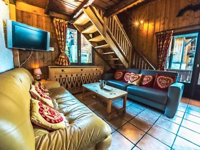 Coin salon dans l'établissement Appartement duplex confort 8 pers · Proche pistes · Animaux admis - FR-1-502-356