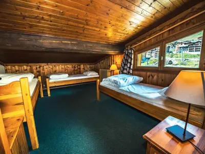 Un ou plusieurs lits dans un hébergement de l'établissement Appartement duplex confort 8 pers · Proche pistes · Animaux admis - FR-1-502-356