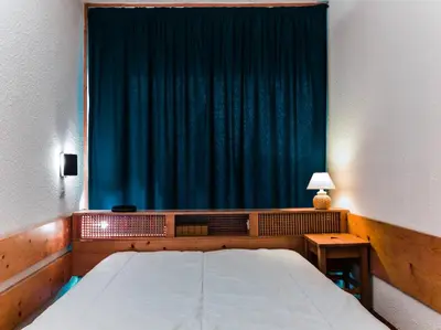 Un ou plusieurs lits dans un hébergement de l'établissement Résidence Nova - Appartement 2 pièces 6 personnes proche des pistes, des commerces, de la garderie et de l'ESF au centre de la station d’Arc 1800 MAE-6558