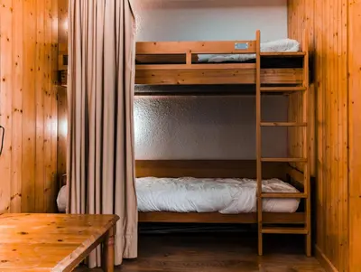 Un ou plusieurs lits superposés dans un hébergement de l'établissement Résidence Nova - Appartement 2 pièces 6 personnes proche des pistes, des commerces, de la garderie et de l'ESF au centre de la station d’Arc 1800 MAE-6558