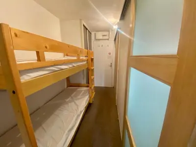 Un ou plusieurs lits dans un hébergement de l'établissement Studio de 25 m² avec balcon à Tignes - FR-1-449-188