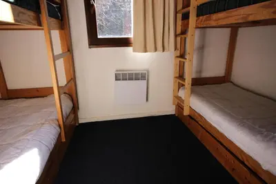 Un ou plusieurs lits dans un hébergement de l'établissement Résidence Rey - Plan Peisey - Appartement 2 pièces 6 personnes à Plan Peisey proche des commerces et des pistes MAE-1885