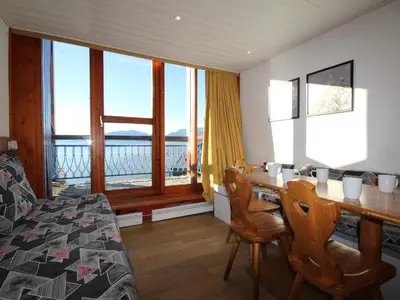 Coin salon dans l'établissement Duplex calme avec balcon - 6 pers, Charmettoger - FR-1-346-335