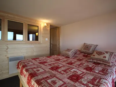 Un ou plusieurs lits dans un hébergement de l'établissement Duplex calme avec balcon - 6 pers, Charmettoger - FR-1-346-335