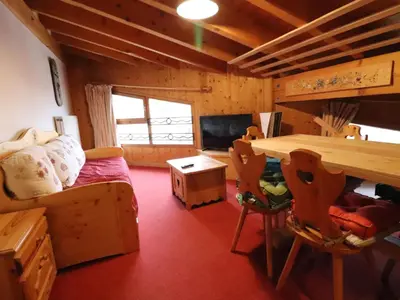 Coin salon dans l'établissement Appartement Confortable au Cœur de Tignes le Lac, Idéal pour 6 Personnes - FR-1-502-373