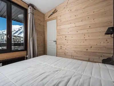 Un ou plusieurs lits dans un hébergement de l'établissement Confortable 2 pièces avec balcon à Tignes - FR-1-502-378