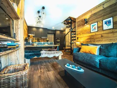Coin salon dans l'établissement Duplex rénové à Tignes - 6 pers, balcon, proche pistes et commerces - FR-1-502-366