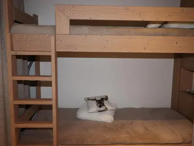 Un ou plusieurs lits dans un hébergement de l'établissement Appartement skis aux pieds rénové avec balcon, 6 pers, Val Claret - FR-1-502-365