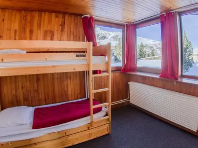 Un ou plusieurs lits dans un hébergement de l'établissement Appartement rénové 3 pièces à Tignes - Ski aux pieds, balcon, idéal pour 7 pers. - FR-1-502-368