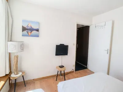 Un ou plusieurs lits dans un hébergement de l'établissement Appartement rénové 6 pers, sur pistes, balcon, animaux et wifi - FR-1-502-395