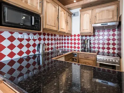 Cuisine ou kitchenette dans l'établissement Appartement confort 6 pers, proche pistes, balcon à Tignes - FR-1-502-403