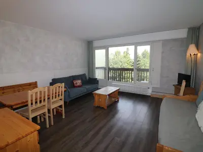Coin salon dans l'établissement Appartement 2 pièces lumineux à Tignes, proches pistes et commerces - FR-1-502-408