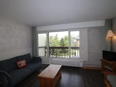 Coin salon dans l'établissement Appartement 2 pièces lumineux à Tignes, proches pistes et commerces - FR-1-502-408
