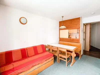 Coin salon dans l'établissement Appartement lumineux Départ et retour skis aux pieds Balcon - FR-1-502-401