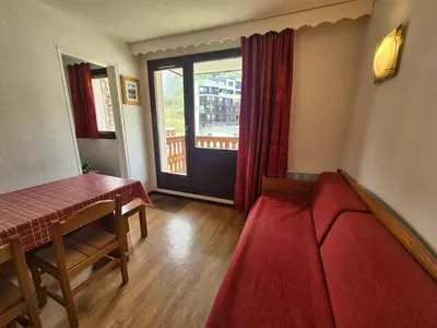 Coin salon dans l'établissement Studio 4 pers. pieds des pistes avec balcon à Tignes - FR-1-502-409