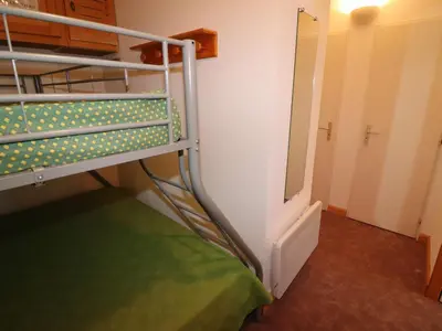 Un ou plusieurs lits dans un hébergement de l'établissement Studio fonctionnel & lumineux · 5 pers · Pied des pistes · Balcon - FR-1-502-416