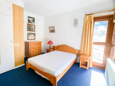 Un ou plusieurs lits dans un hébergement de l'établissement Appartement lumineux au pied des pistes, animaux admis - FR-1-502-437