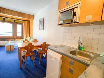 Cuisine ou kitchenette dans l'établissement Appartement lumineux au pied des pistes, animaux admis - FR-1-502-437