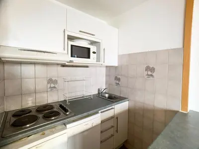Cuisine ou kitchenette dans l'établissement Studio lumineux & fonctionnel proche pistes et commerces - Balcon - Animaux acceptés - FR-1-502-447